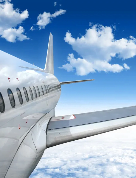 sideview of an airplane in the air
